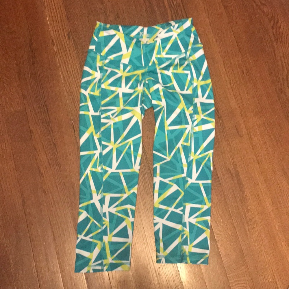 Green and white patterned workout leggings